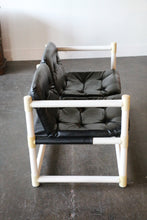 Load image into Gallery viewer, MCM mid-century modern white PVC love seat  with black vinyl upholstery in the style of Jerry Johnson for Landes Manufacturing Co.
