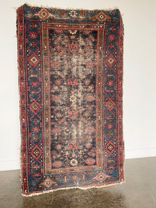 Antique Handknotted Wool Rug
