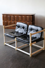 Load image into Gallery viewer, MCM mid-century modern white PVC love seat  with black vinyl upholstery in the style of Jerry Johnson for Landes Manufacturing Co.
